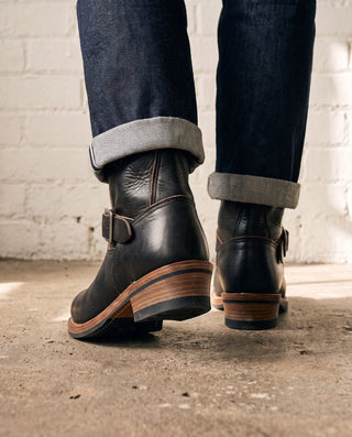 Black 3530 engineer boots rear three-quarter showing the stacked leather heel