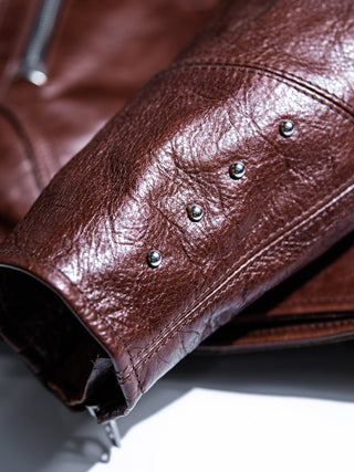 Cuff zipper hardware of the brown Archetype D-Pocket jacket, detail