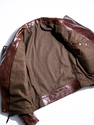 Classic American plaid sleeve lining of the brown Archetype jacket, detail