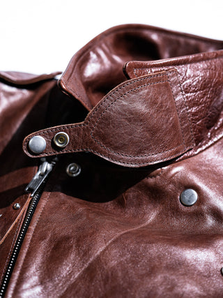 Throat latch of the brown Archetype D-Pocket jacket, detail