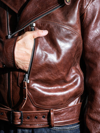 The rounded D-Pocket on the brown Archetype jacket, worn