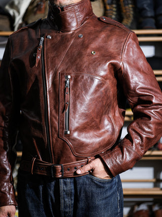 Brown Archetype D-Pocket jacket worn with the collar turned up