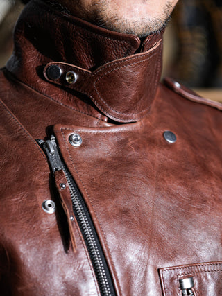 Throat latch of the brown Archetype D-Pocket jacket, worn